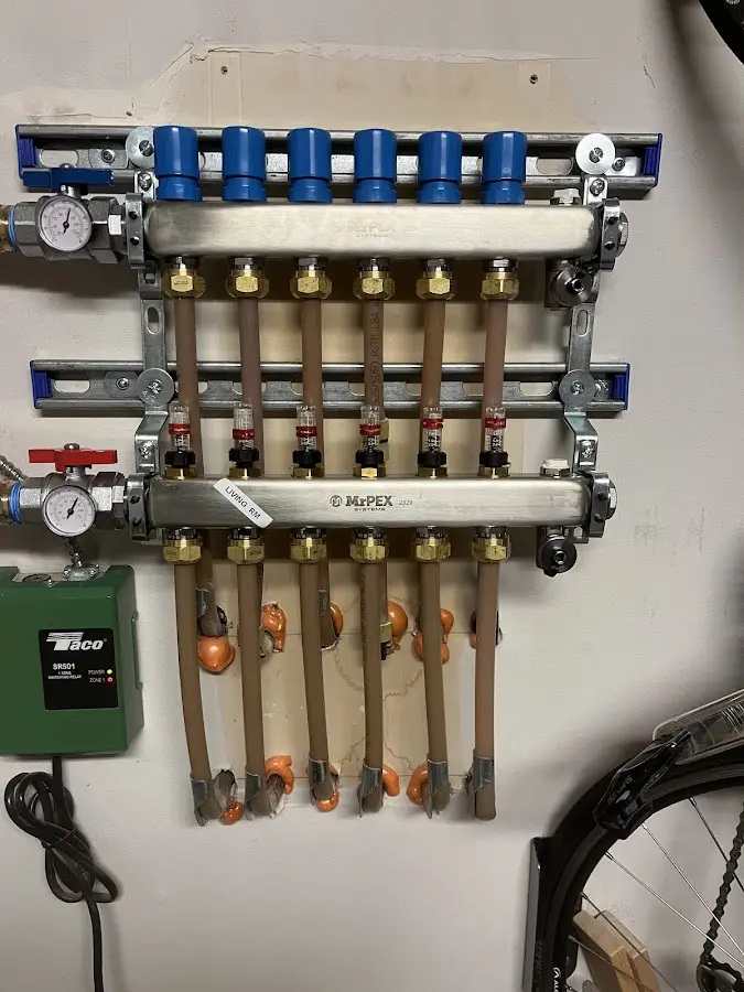 Plumber performing Gas Line Installation at a residential property in Haring